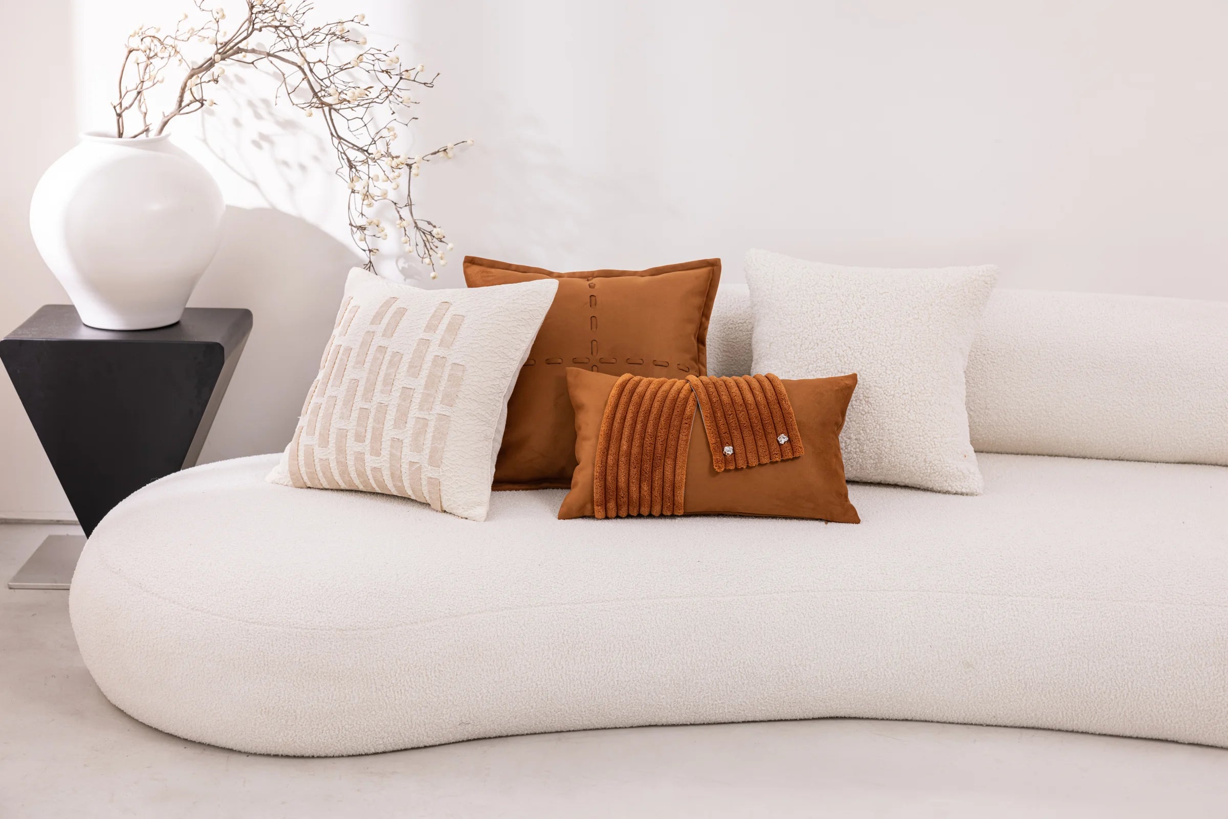 Amber Rhythm — four cushions in a living space