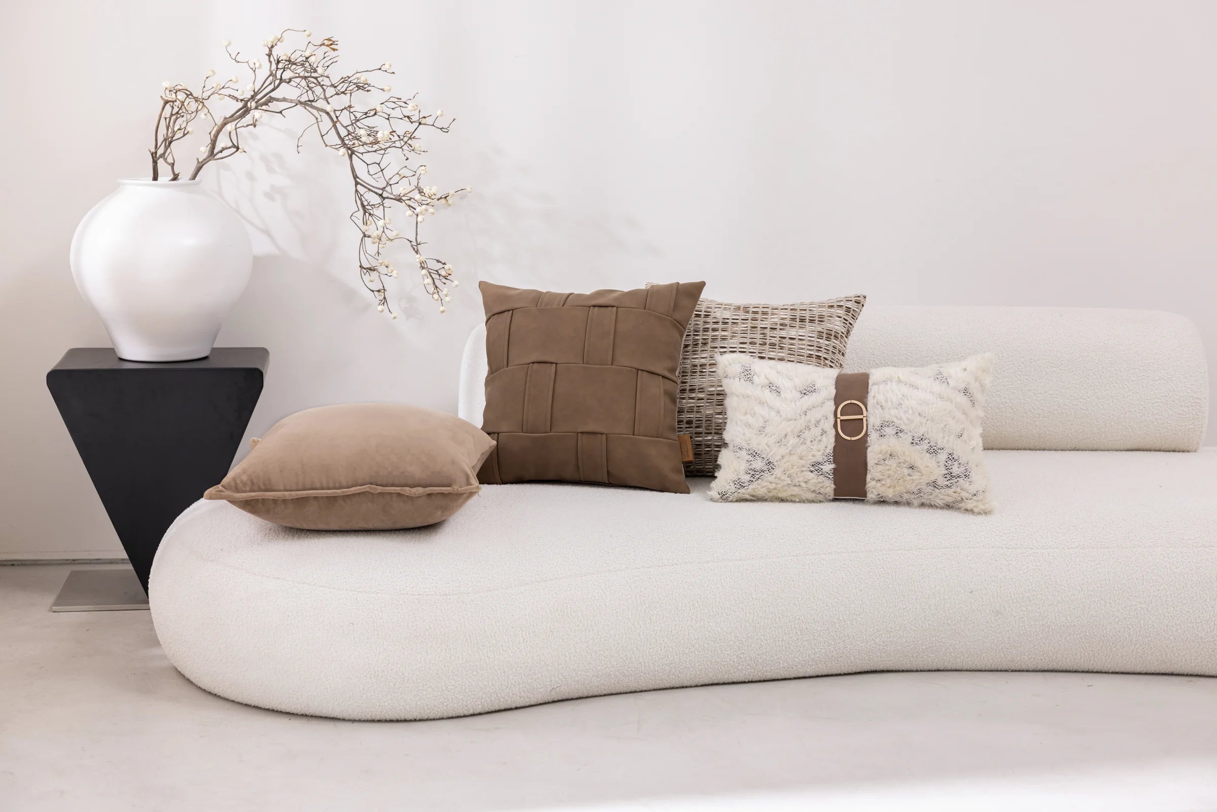 Sand Archive — four cushions in a living space