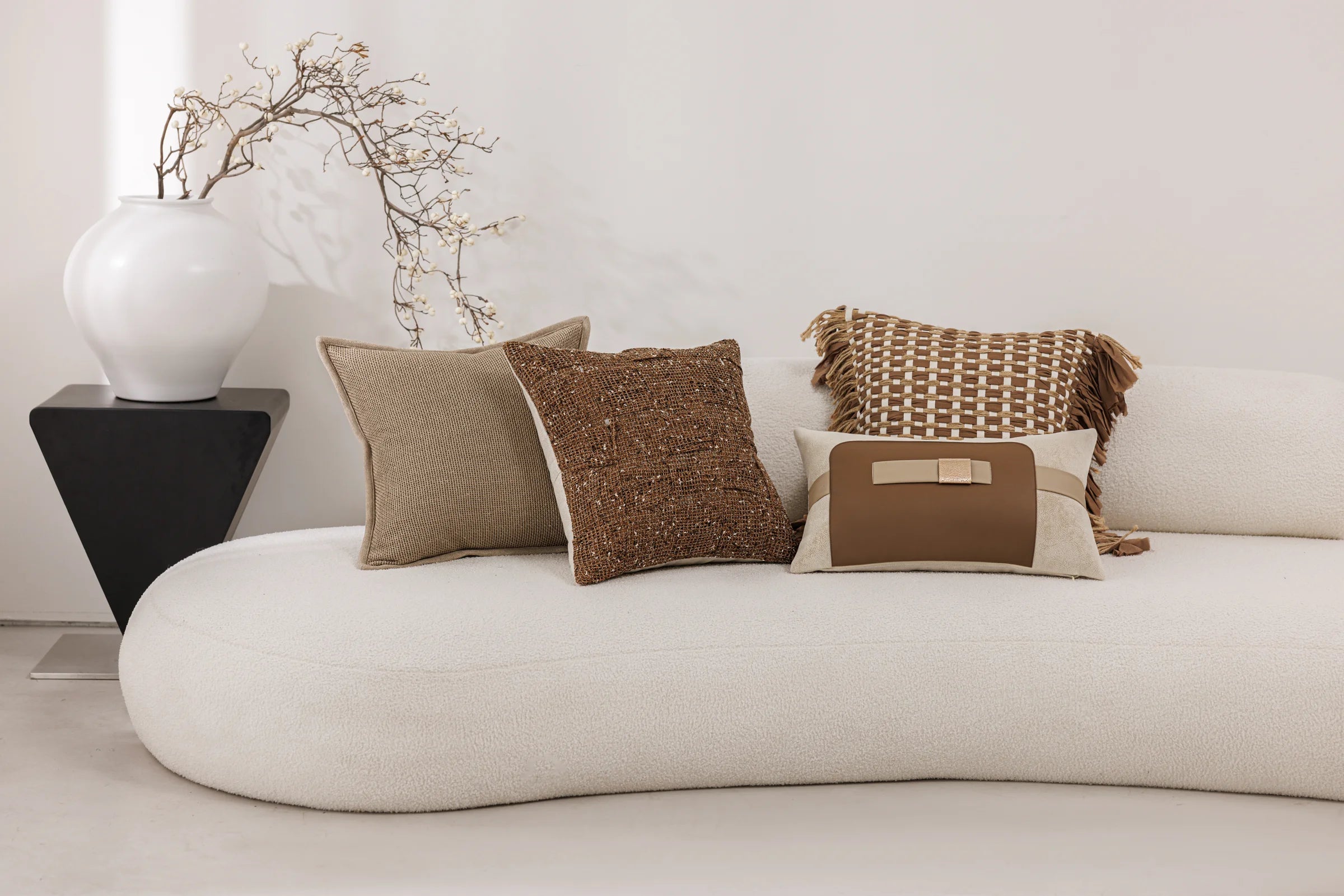 Earth Weave — four cushions in a living space