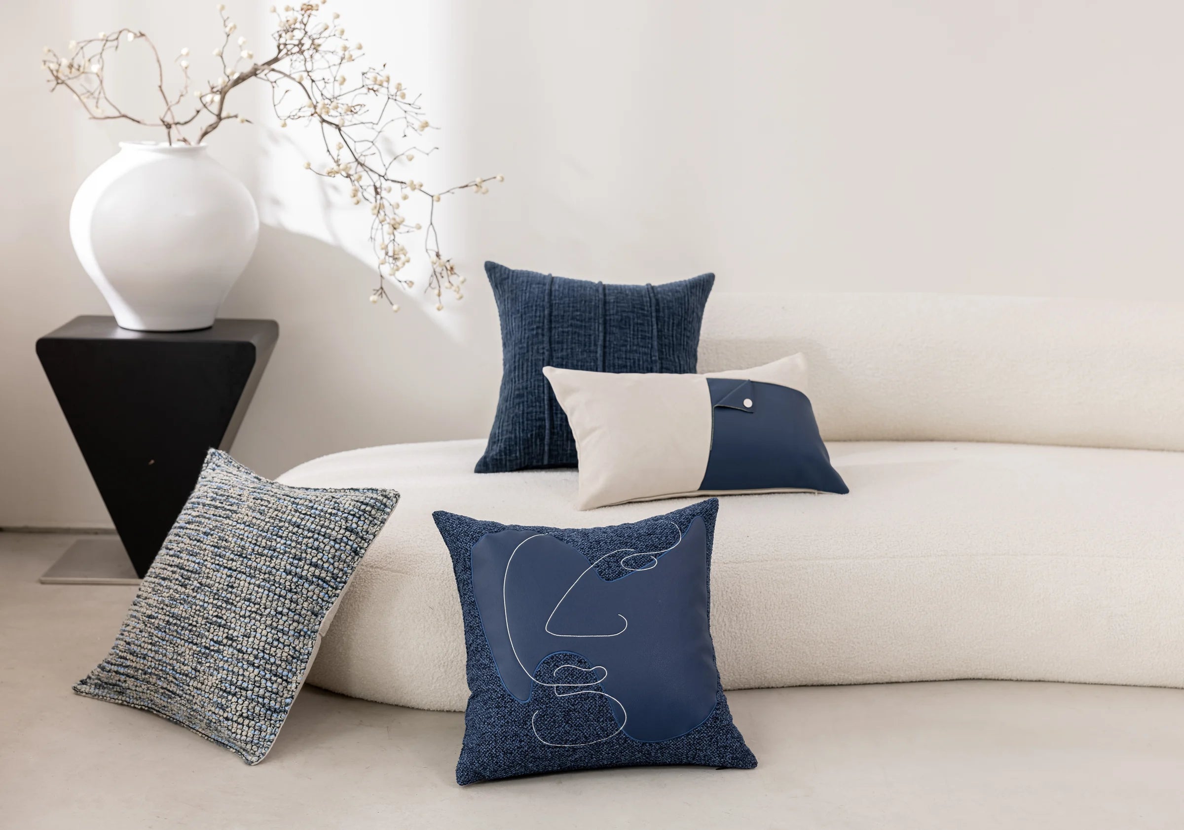 Midnight Line — four cushions in a living space
