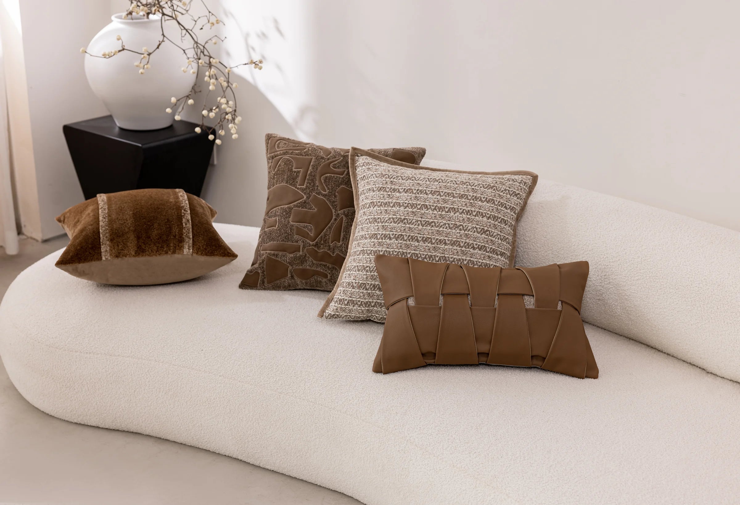 Bronze Relief — four cushions in a living space