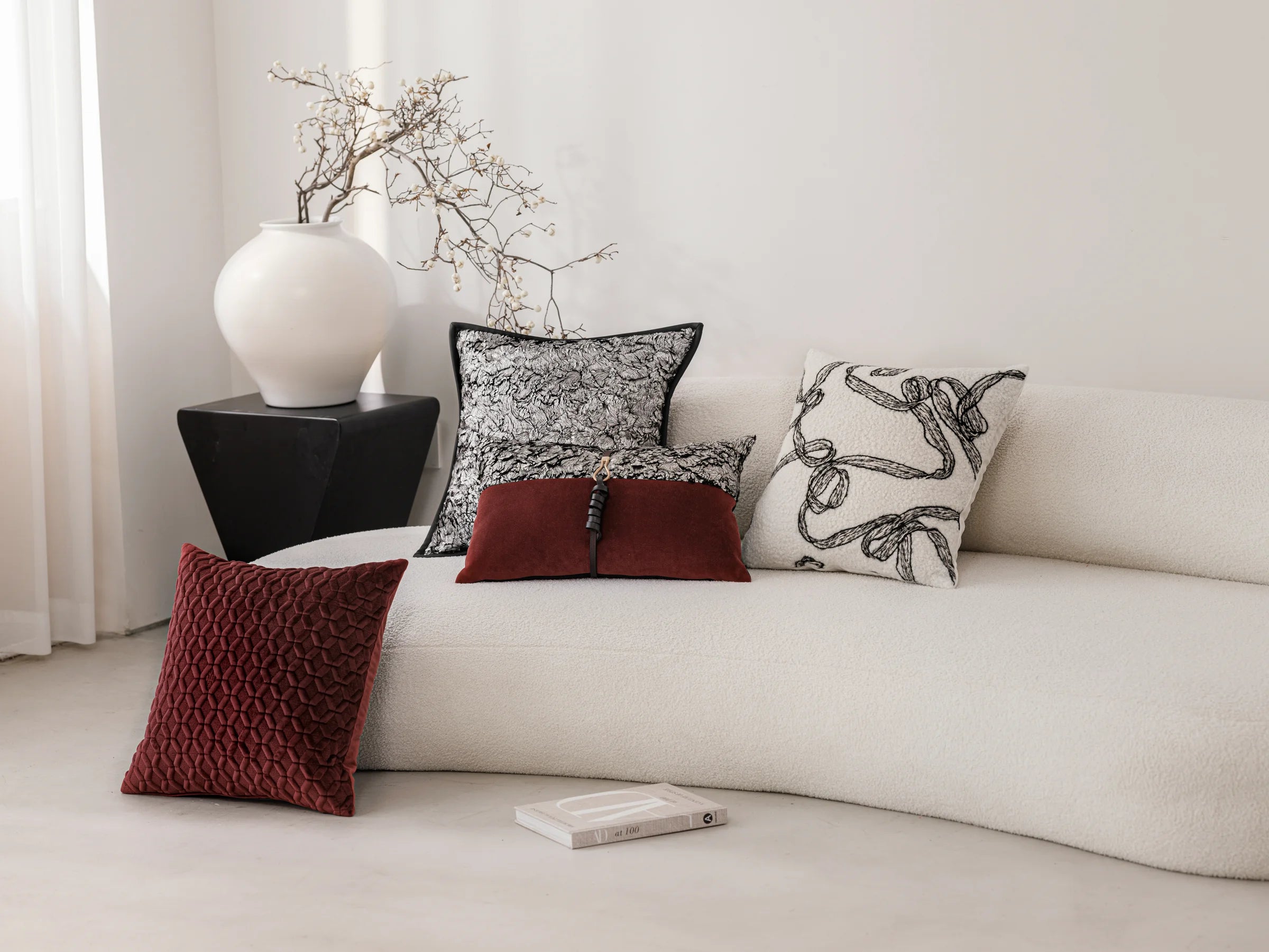 Crimson Ink — four cushions in a living space